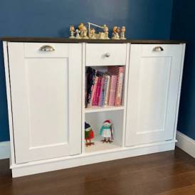 white cabinet with shelf in middle