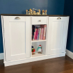 white cabinet with shelf in middle